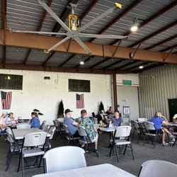 Old Bust Head Brewing Company - Rear outside covered seating and entertainment area