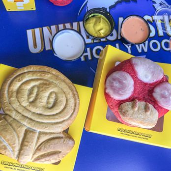 Power Up Cafe - Fire Flower Pretzel with dipping sauces and Super Mushroom Calzone - Themed Cafes Near Me - Universal City, California