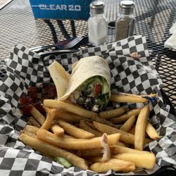 The Crowsnest Pub - Greek chicken wrap with fries.