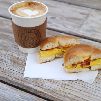 Coffee Kiosk - Egg, bacon, and cheese bagel sandwich, followed by a latte made with lots of love. - Coffee & Tea Near Me - Santa Clarita, California Coffee Kiosk - Egg, bacon, and cheese bagel sandwich, followed by a latte made with lots of love. - Coffee & Tea Near Me - Santa Clarita, California