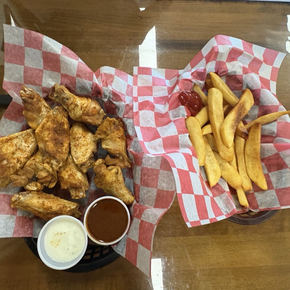 The Dugout Cafe - $.70 chicken wings. A side of crispy piping hot fries delicious - Breakfast & Brunch Near Me - Venice, Florida The Dugout Cafe - $.70 chicken wings. A side of crispy piping hot fries delicious - Breakfast & Brunch Near Me - Venice, Florida