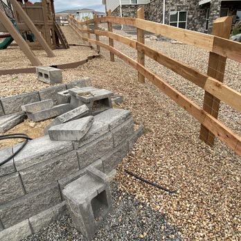 A & B Quality Fence - Backyard by playground and retaining wall - Fences & Gates Near Me