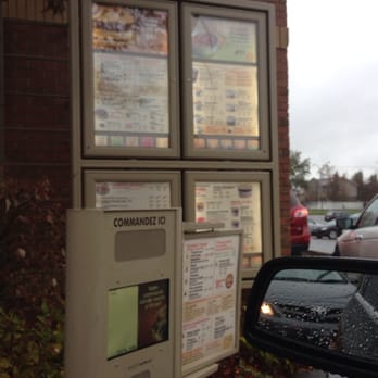 Tim Horton's - a car parked in front of a restaurant - Coffee & Tea Near Me Tim Horton's - a car parked in front of a restaurant - Coffee & Tea Near Me