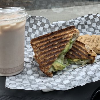 Tin Roof Cafe - Chai Latte Cold, Peanut Butter Cookie, and Avocado Pesto Grilled Cheese Sandwich - Coffee & Tea Near Me - Erin, Ontario