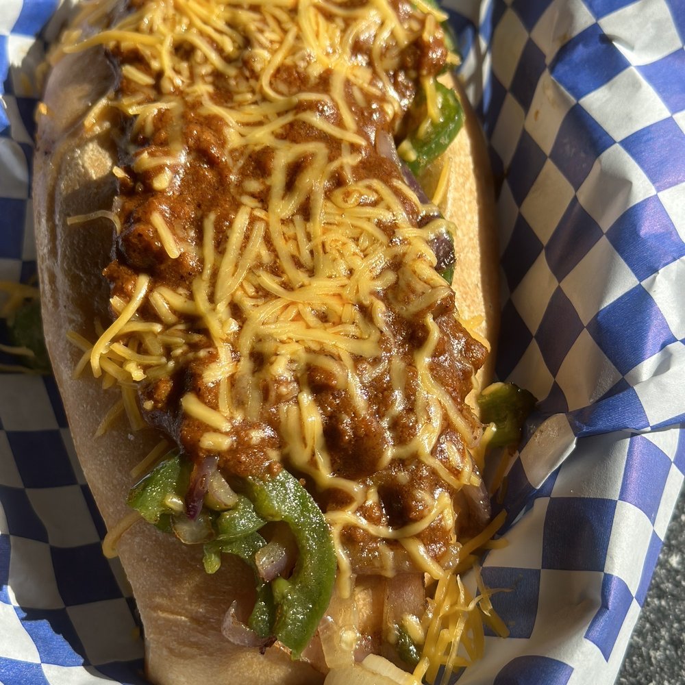 Daddio's Burger - Custom made hotdog with chili, cheese, grilled onions and grilled jalapeños. - Burgers Near Me - Beaumont, Texas