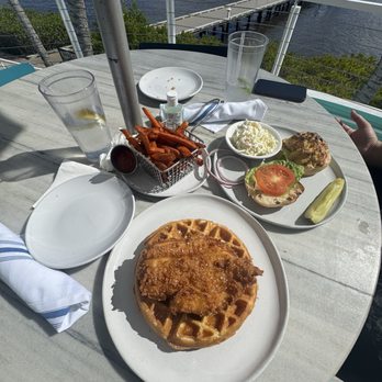 TideHouse - Chicken and waffles, sweet potato fries & krab sandwich with a side of coleslaw - Seafood Near Me - Stuart, Florida
