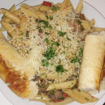 Robins Tea House - Lamb,curry, feta meatballs, roasted red peppers, artichokes on penne pasta with light cream sauce side of rustic bread - American Near Me - Henrico, Virginia
