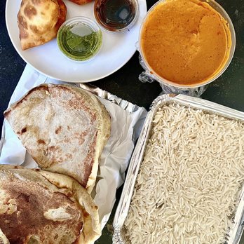 Kama - Vegetable samosas, garlic and butter naan, butter chicken tikka masala, and basmati rice - Indian Near Me - La Grange, Illinois Kama - Vegetable samosas, garlic and butter naan, butter chicken tikka masala, and basmati rice - Indian Near Me - La Grange, Illinois