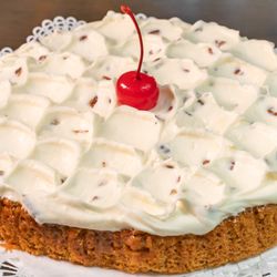 Sophia's Old-Fashioned Desserts #1 seller, is Fargo's Pizza Company's Sophia's 14k Gold Nugget Carrot Cake sold by the slice or whole to go.