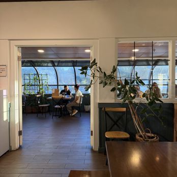Mi Sant - Green house seating area - Bakeries Near Me - Roseville, Minnesota