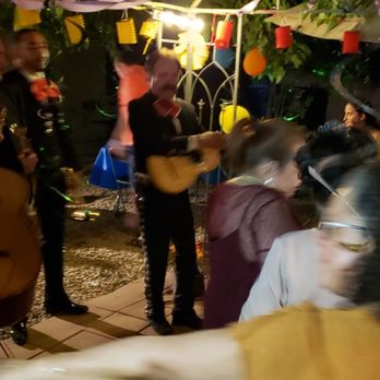 Mariachi de Mexico - a group of people playing music - Musicians Near Me Mariachi de Mexico - a group of people playing music - Musicians Near Me