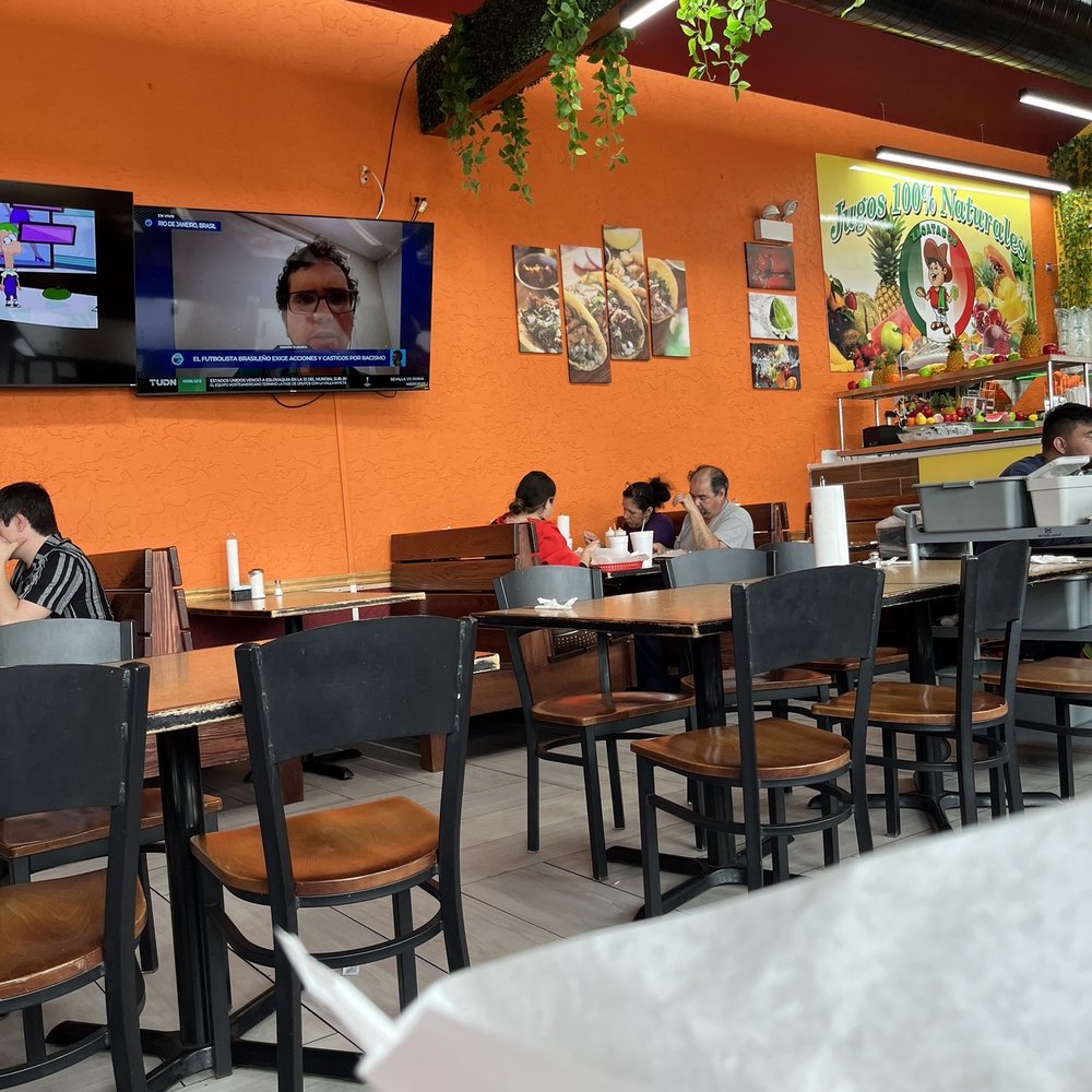 Zacatacos - people sitting at tables in a restaurant - Mexican Near Me - Chicago, Illinois Zacatacos - people sitting at tables in a restaurant - Mexican Near Me - Chicago, Illinois