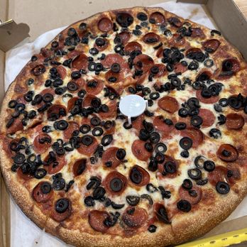 Mustachio's Pizzeria - Large pizza: pepperoni and black olive - Pizza Near Me - Buffalo, New York Mustachio's Pizzeria - Large pizza: pepperoni and black olive - Pizza Near Me - Buffalo, New York