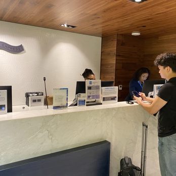 American Express Centurion Lounge - Check in table at front - Airport Lounges Near Me - Los Angeles, California