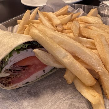 Toscana Pool Bar and Grill - Turkey club wrap - Gastropubs Near Me - Orlando, Florida Toscana Pool Bar and Grill - Turkey club wrap - Gastropubs Near Me - Orlando, Florida