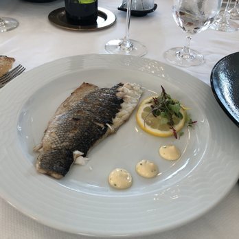 Sails Restaurant - Mediterranean sea bass- melts in your mouth. - Seafood Near Me - Naples, Florida Sails Restaurant - Mediterranean sea bass- melts in your mouth. - Seafood Near Me - Naples, Florida