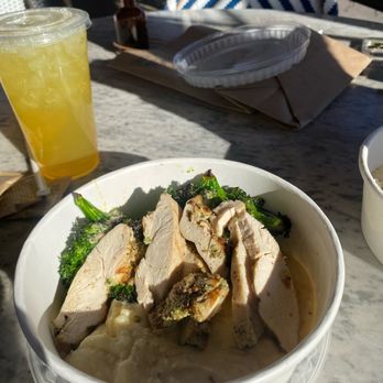 Flower Child - Chicken with Smashed Gold Potato and Roasted Broccoli and green Iced Tea - New American Near Me - Chandler, Arizona