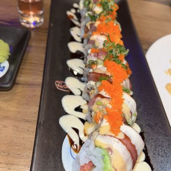 Hinoka Sushi - Phoenix Roll: Unagi tempura, cream cheese and spicy tuna topped with tuna, avocado and scallion, house sauce, and masago. - Sushi Bars Near Me - Sacramento, California Hinoka Sushi - Phoenix Roll: Unagi tempura, cream cheese and spicy tuna topped with tuna, avocado and scallion, house sauce, and masago. - Sushi Bars Near Me - Sacramento, California