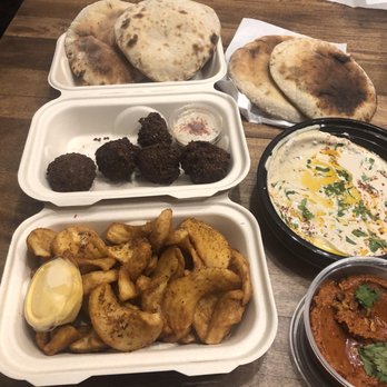Safta - A full spread - hummus, falafel, pitas, etc... - Middle Eastern Near Me - Denver, Colorado
