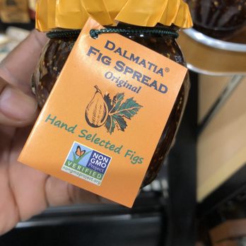 Publix - a hand holding a jar of fig spread - Grocery Near Me - Stockbridge, Georgia