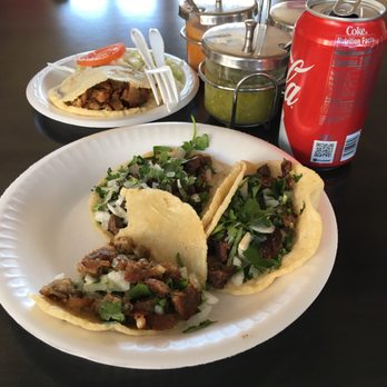 Mi Lindo Michoacan - 2 asada tacos, 1 carnitas taco (i couldn't resist biting into it before pic lol) and carnitas Gordita. Trio salsa...BOMB!!! - Mexican Near Me - Rialto, California Mi Lindo Michoacan - 2 asada tacos, 1 carnitas taco (i couldn't resist biting into it before pic lol) and carnitas Gordita. Trio salsa...BOMB!!! - Mexican Near Me - Rialto, California