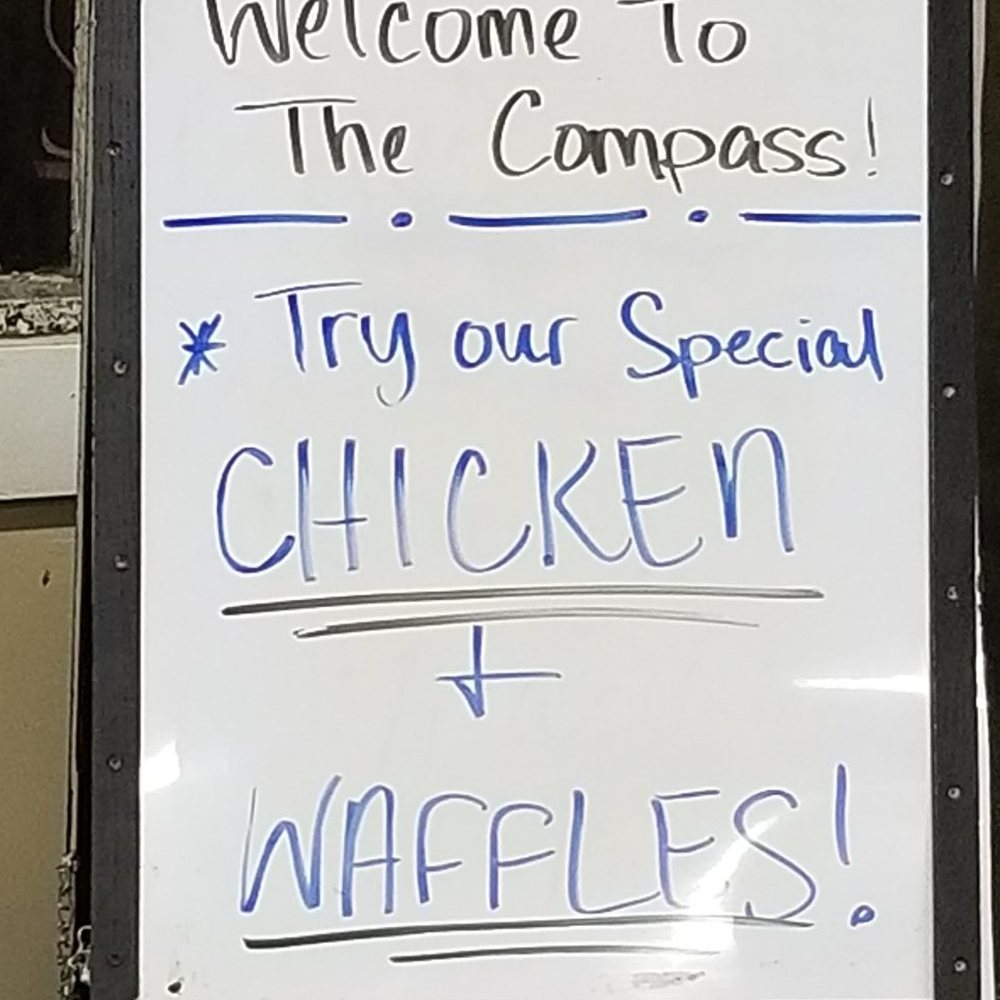 The Compass - a sign for a chicken shop - Pizza Near Me - McAlester, Oklahoma