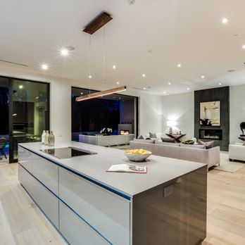 Prime Five Homes - a modern kitchen and living room - General Contractors Near Me - Los Angeles, California Prime Five Homes - a modern kitchen and living room - General Contractors Near Me - Los Angeles, California