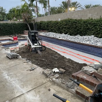 Master Demolition - Day 3 - bobcat speeds up the demo process when inside the pool shell - Demolition Services Near Me - Orange, California