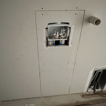 Cachorros Drywall - Drywall patch repair with plumbing access panel installation - Drywall Installation & Repair Near Me - San Antonio, Texas