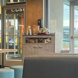 Over filled trash vibrant and trash on top of the counter.  Worst yet the workers complained of emptying.