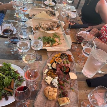 Miramonte Winery - Table with flatbreads and board - Wineries Near Me - Temecula, California Miramonte Winery - Table with flatbreads and board - Wineries Near Me - Temecula, California