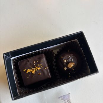 Gail Ambrosius Chocolatier - Blood orange caramel (left) and machu picchu (right) - Chocolatiers & Shops Near Me - Madison, Wisconsin