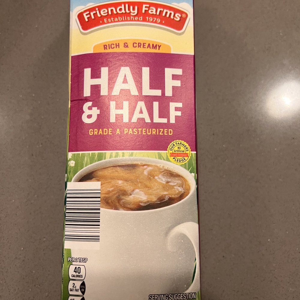 ALDI - Still life of a Land of No Lakes with overtly generic mug. "Serving suggestion: homogenized." - Grocery Near Me - Northridge, California