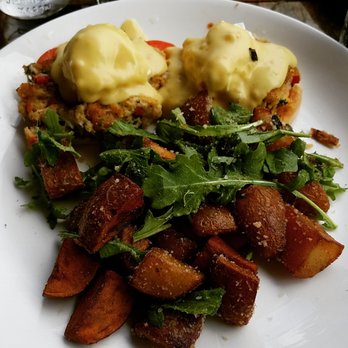 Farmer's Table - Crab cake benedict with parmesan truffle potatoes with arugala. Delicious! - New American Near Me - La Mesa, California Farmer's Table - Crab cake benedict with parmesan truffle potatoes with arugala. Delicious! - New American Near Me - La Mesa, California