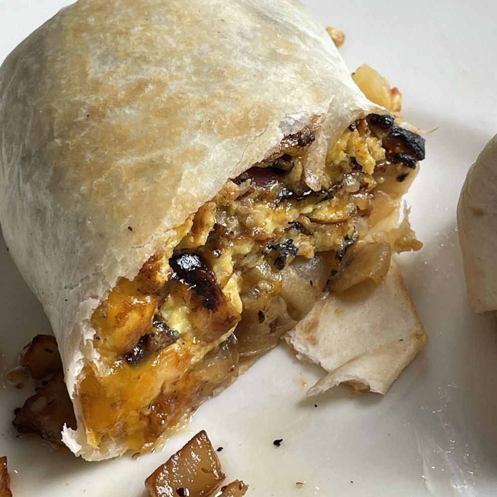 Grill37 - Breakfast burrito which was large but with overcooked dry eggs and burnt bacon - American Near Me - Pomfret, Connecticut