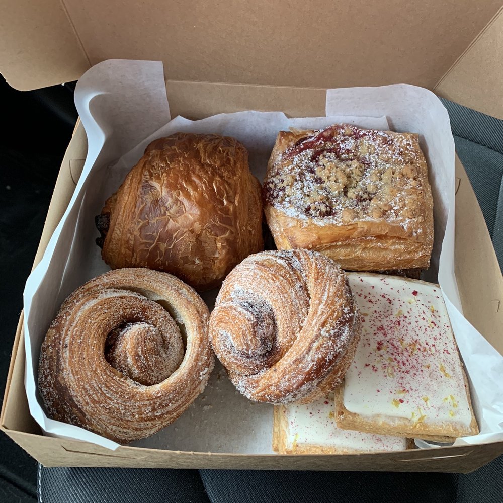 Butter Block - Left to right: chocolate croissant, (2) cherry pistachio danishes, lemon raspberry Poptarts, cinnamon morning buns - Bakeries Near Me - Buffalo, New York Butter Block - Left to right: chocolate croissant, (2) cherry pistachio danishes, lemon raspberry Poptarts, cinnamon morning buns - Bakeries Near Me - Buffalo, New York