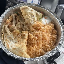 El Puerto Mexican Restaurant - Supposed to be fajitas... Literally just chicken and funky cheese... Flavorless don't waste your money