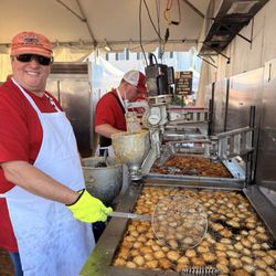 Apple Harvest Festival - Smiles at the fritters booth.