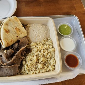The Kebab Shop - Plate with Carved Lamb Beef, Truffle Brown Rice, and Pita and Hummus. Sauces on the side from the Sauce Bar. - Mediterranean Near Me - Cerritos, California The Kebab Shop - Plate with Carved Lamb Beef, Truffle Brown Rice, and Pita and Hummus. Sauces on the side from the Sauce Bar. - Mediterranean Near Me - Cerritos, California
