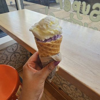 Jeni's Splendid Ice Creams - Waffle cone with lemon bar and wild lavender scoops - Ice Cream & Frozen Yogurt Near Me - Saint Louis, Missouri Jeni's Splendid Ice Creams - Waffle cone with lemon bar and wild lavender scoops - Ice Cream & Frozen Yogurt Near Me - Saint Louis, Missouri