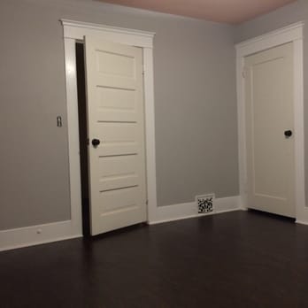Seabreeze Renovators - After - new drywall on walls and ceiling, new laminate flooring - General Contractors Near Me