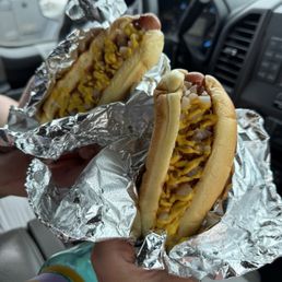 Hotdog with chili mustard and onions