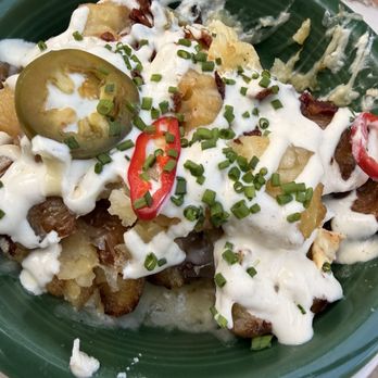 Castell Terrace - Loaded smash potatoes - Lounges Near Me - New York, New York Castell Terrace - Loaded smash potatoes - Lounges Near Me - New York, New York