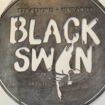 Black Swan Brewing - a metal sign hanging on a wall - Breweries Near Me - Stratford, Ontario Black Swan Brewing - a metal sign hanging on a wall - Breweries Near Me - Stratford, Ontario