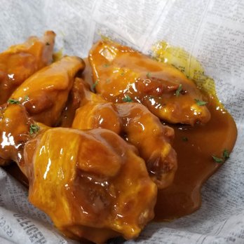Outlaw Wings - I honestly can't remember which sauce is which anymore... sorry. But it was all good!! - Chicken Wings Near Me - Broomfield, Colorado