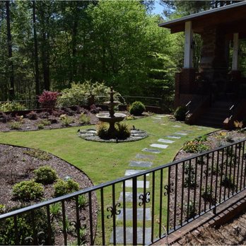 Lancescape - a garden with a fountain in the center - Landscaping Near Me - Columbia, South Carolina Lancescape - a garden with a fountain in the center - Landscaping Near Me - Columbia, South Carolina