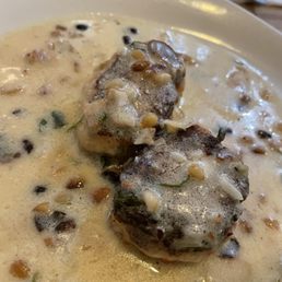Crabcakes in a wonderful garlic with pinenuts sauce Crabcakes in a wonderful garlic with pinenuts sauce