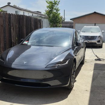 Modern America Electric - Happy Tesla charging at home - Electricians Near Me - Garden Grove, California Modern America Electric - Happy Tesla charging at home - Electricians Near Me - Garden Grove, California
