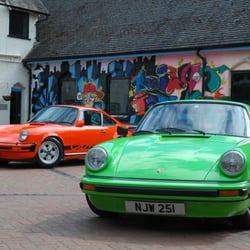 Courtyard Youth Arts Centre - Cars in front of the Graffiti wall - this is the music workshop behind.