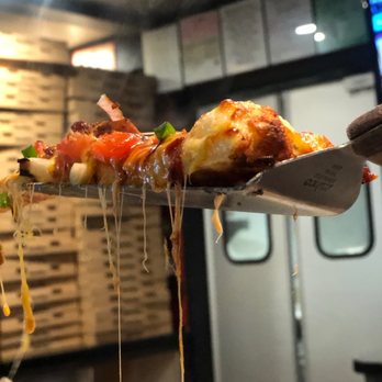 Round Table Pizza - Cheese pull with crispy crust! - Pizza Near Me - Half Moon Bay, California Round Table Pizza - Cheese pull with crispy crust! - Pizza Near Me - Half Moon Bay, California